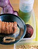 Preparation of veal with ingredients beetroot, garlic and pine nuts