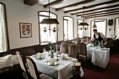 Tables laid in restaurant, Germany