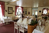 Tables laid in restaurant, Germany