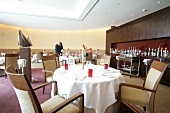 Laid tables and chairs in Le Ciel Restaurant at Hotel Intercontinental Resort in Germany