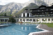 View of Hotel Gut Brandlhof with swimming pool in front, Saalfelden, Salzburg, Austria