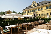 Tables laid outside restaurant in Austria