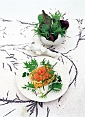 Salmon served with salad of brawn and wild herbs