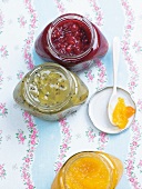 Cherry, banana and kiwi jam in jars