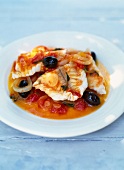 Snapper with tomatoes and black olives cooked in Provencal style