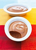Close-up of chocolate mousse in bowls