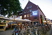 Facade of restaurant and bicycles parked in front, Germany