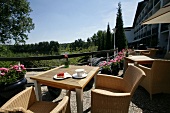 Sitting area with wicker chair in Best Western Premier Hotel, Krautkramer, Germany
