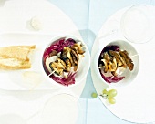 Mushroom skewers on radicchio in bowl