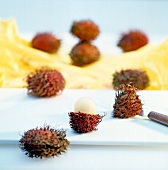 Litchis on chopping board