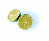 Close-up of halved lemons on white background