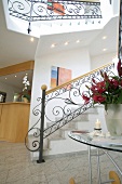 Interior of hotel with reception counter and staircase, Germany