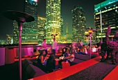 People at rooftop bar at The Standard Hotel, Los Angeles, California, USA, blurred motion