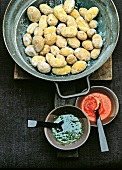 Wrinkled potatoes in wok served with dip from Canary Island, Spain