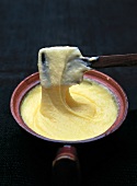 Close-up of aligot in serving dish