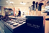 Various cosmetic products of Bobbi Brown arranged in shop