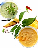 Close-up of kiwi yogurt and pineapple banana shake in glass