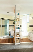 Shower installation, bathtub and shelf in bathroom