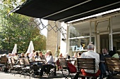 People sitting at outside restaurant