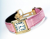 Brillantbesetzte Armbanduhr mit rosa Armband