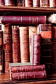 Close-up of old books on shelf in Cafe Pushkin, Moscow, Russia