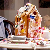 Gingerbread in the form of witch house decorated with candies for Christmas