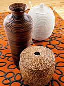African styled woven and rattan baskets on carpet
