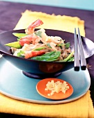 Rise noodles with shrimps and vegetable in Chinese bowl