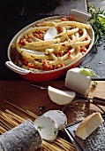 Macaroni with goat cheese in serving dish