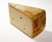 Close-up of gruyere cheese on white background