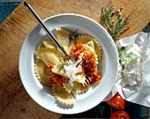 Tortelloni with ricotta and herbs on plate