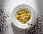 Ricotta tortellini with savoy cabbage in bowl