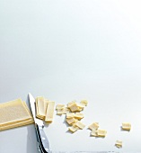 Dough cut into small pieces on white background, copy space