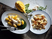 Pumpkin gnocchi with spinach in serving dish and potato gnocchi on plate