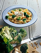 Rigatoni with broccoli on plate