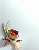 Paprika, chilli and spring onion on white background