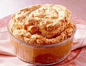 Close-up of lachssouffle in souffle dish