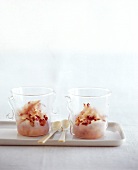 Iced honey apple in glasses with spoons