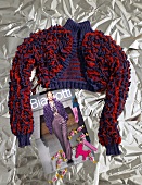 Knitted bolero jacket with ruffles on silver foil