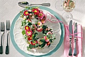 Table settings with flowers letters wreath made of daisies