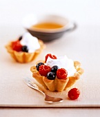 Close-up of berry tart with spoon