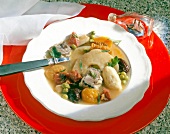 Bowl of hamburg eel soup with spoon