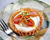 Date tart on platter with fork