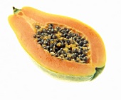Half a papaya with seeds on white background