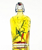 Yellow oil with rosemary and chilli