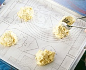 Dough on baking sheet with parchment paper