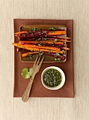 Marinated carrots served with coriander pesto, overhead view