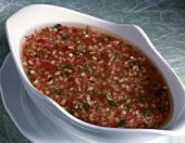 Vinaigrette with red onions, thyme and raspberry vinegar in bowl