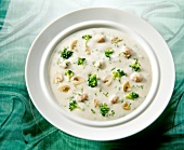 Mushroom soup with broccoli in bowl