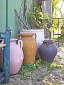 Various clay pots in garden